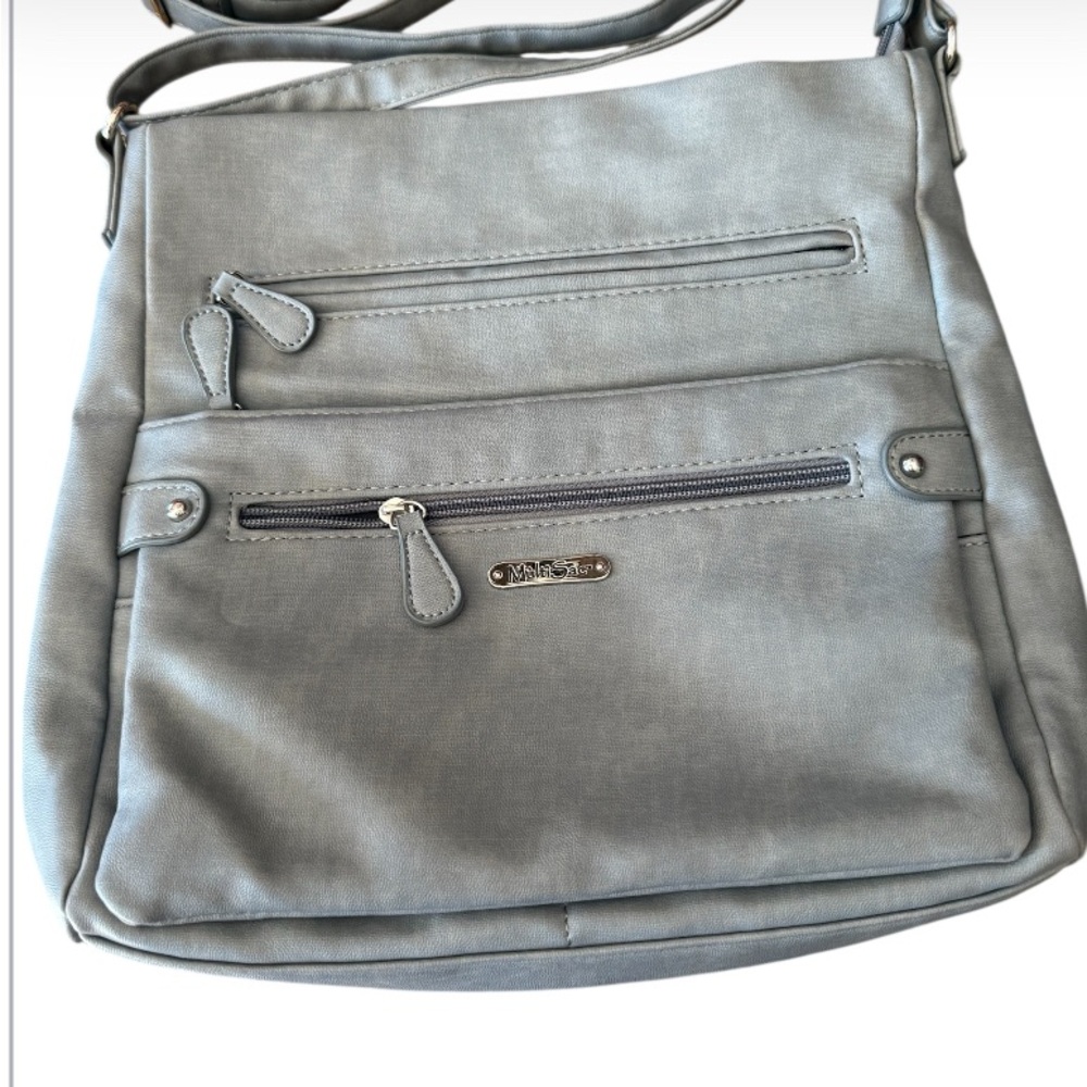 Multi Sac Gray Crossbody Bag.. Excellent condition. 11x12x2”